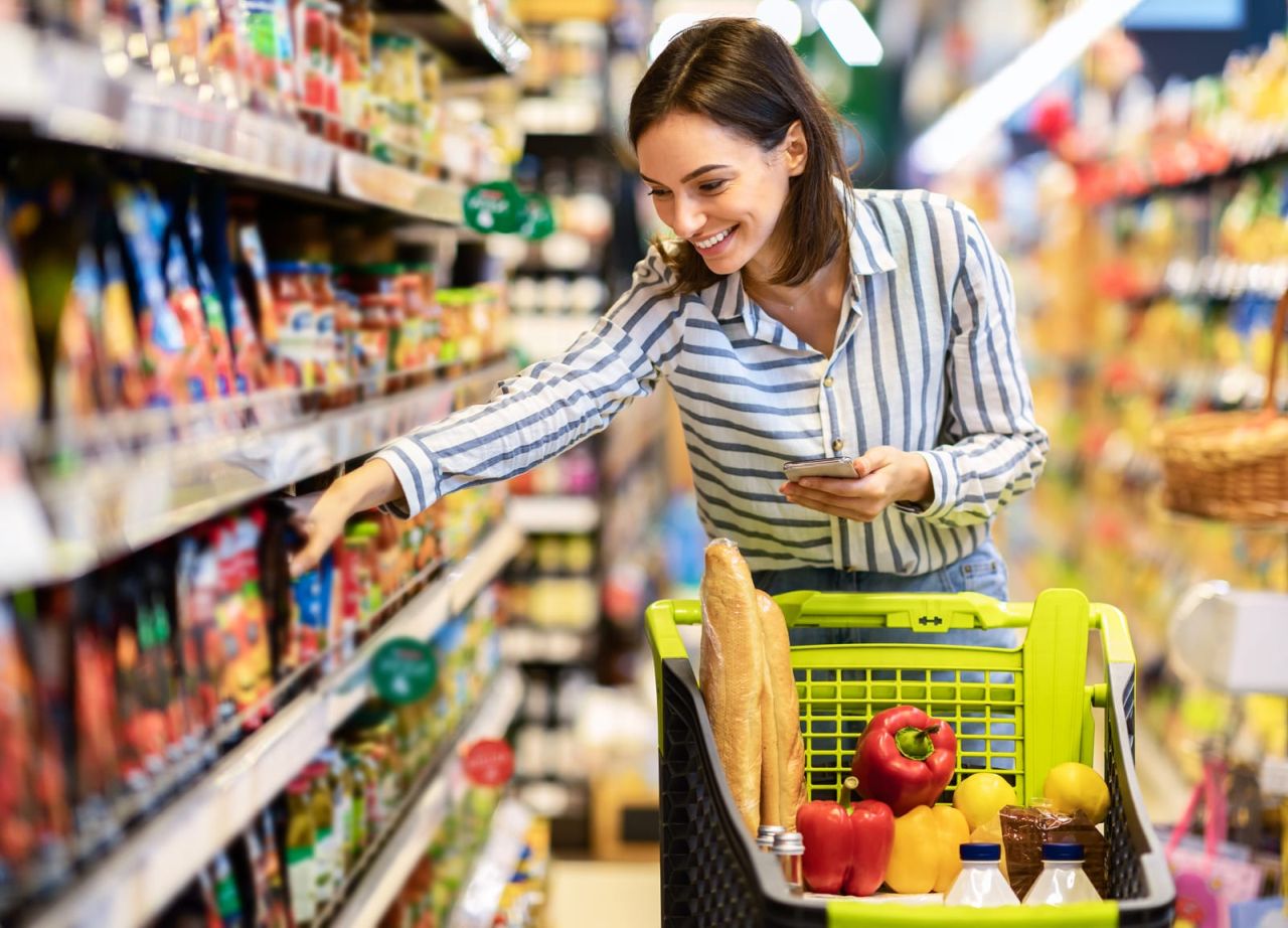 Shopping and Groceries in Switzerland: woman in a grocery store